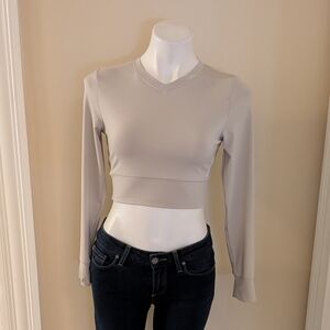 Gymshark Puase tan cropped long sleeve strappy back top size S